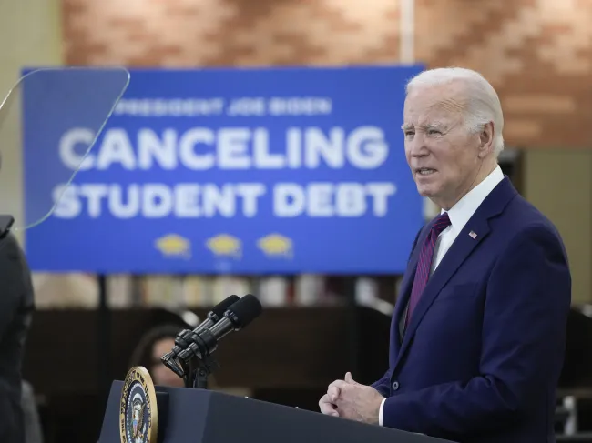 Biden canceling student debt sign